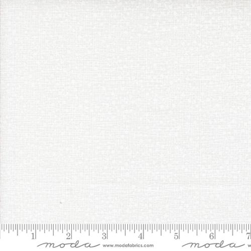 white tiny dots on a white background