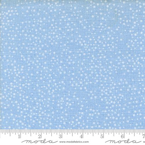 Light blue fabric with a white micro-grid pattern and small white dots