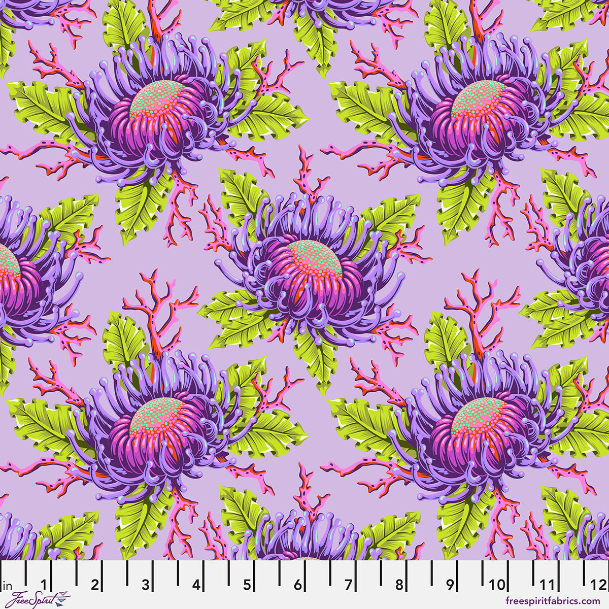 Pattern of colorful flowers and leaves on a purple background.