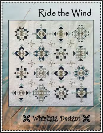 featuring a 4x4 grid of geometric starburst quilt blocks
