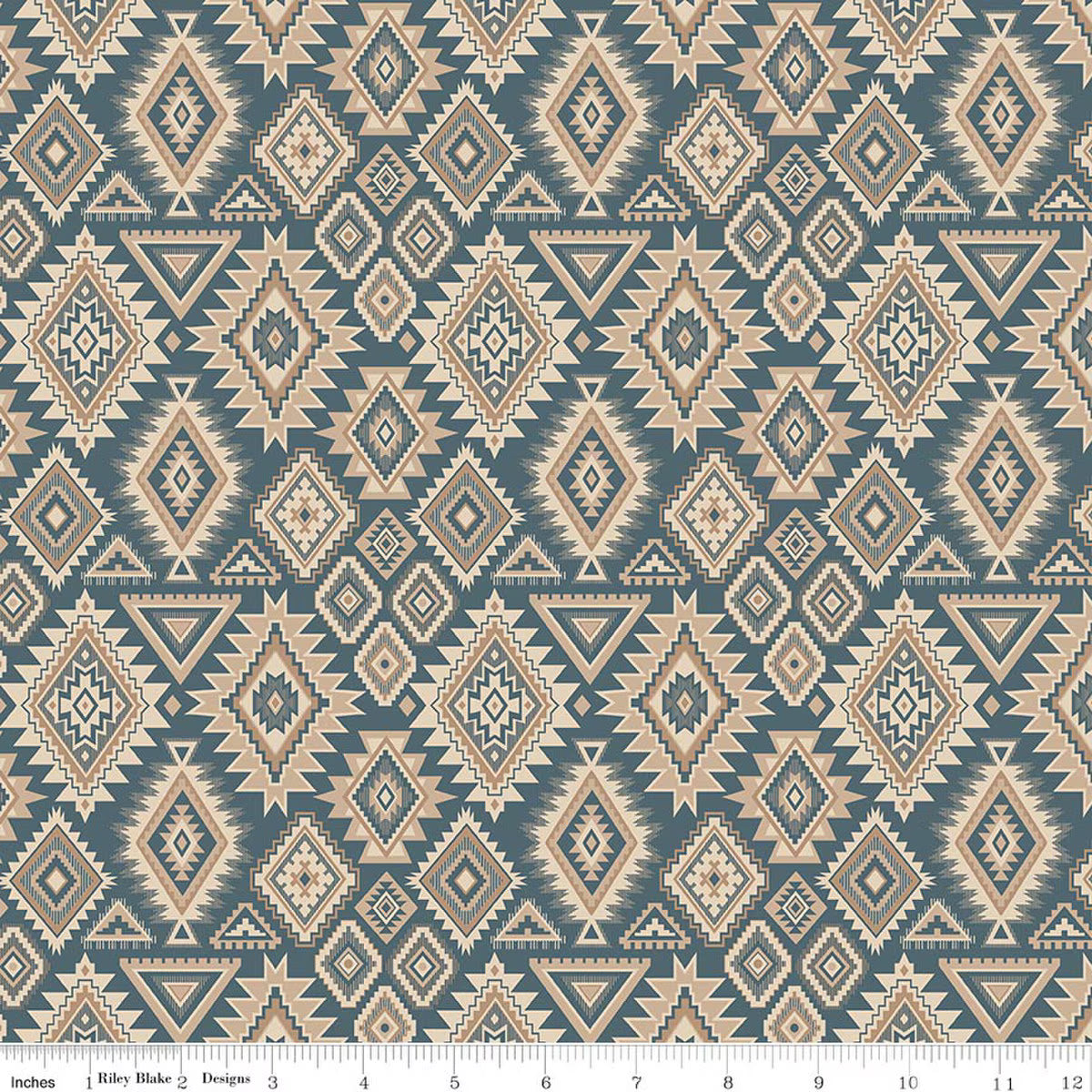 A close-up of a fabric pattern featuring a repeating geometric Southwestern-style diamond and triangle motif in beige and gray on a muted blue-gray background