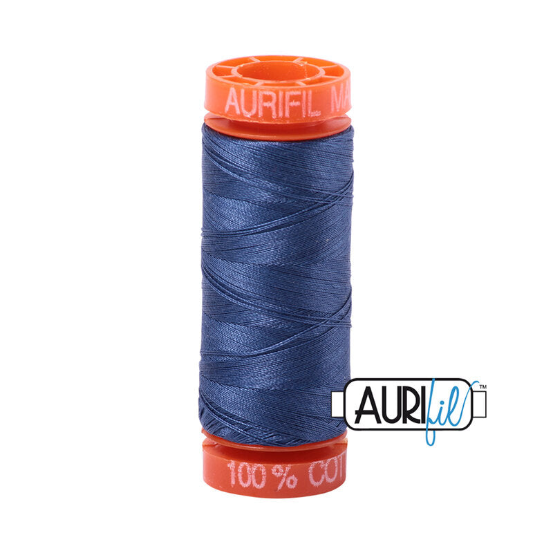 Spool of blue thread with orange cap featuring the Aurifil logo.