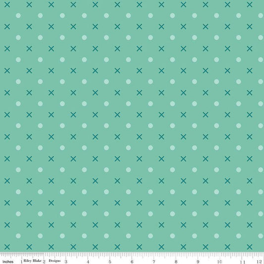  geometric print features an array of x's and dots