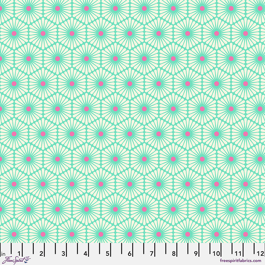 Patterned fabric with green and pink design on a white background