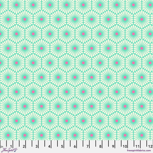 Patterned fabric with green and pink design on a white background