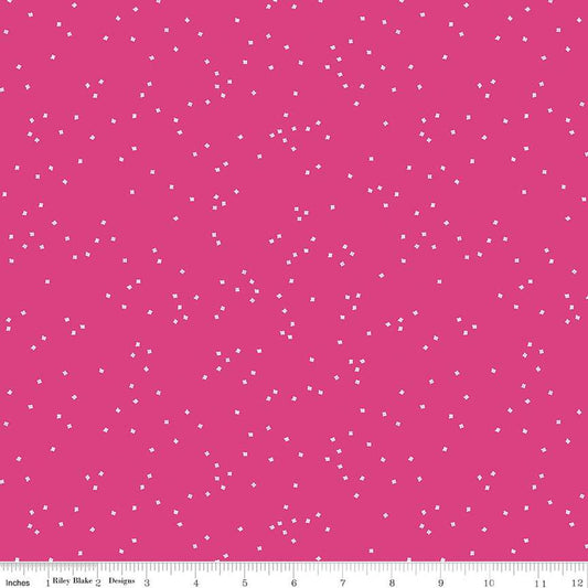 Pink fabric with small  tiny, white confetti blossoms 