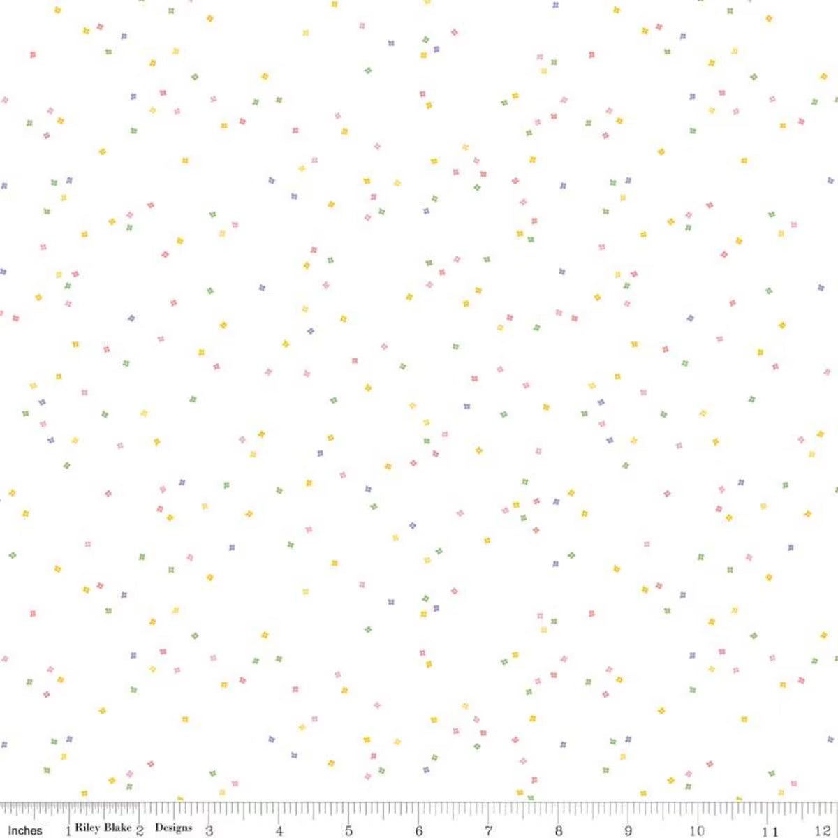  tiny pink, yellow, green and purple colored confetti blossoms on a white background