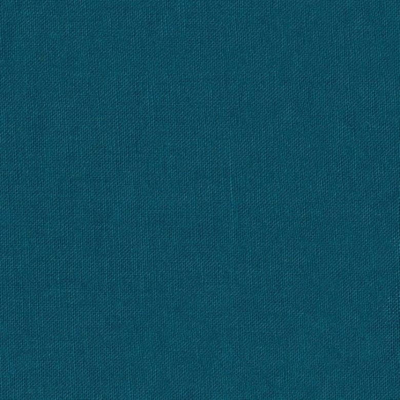 A close-up of a solid teal blue textured fabric, showing a fine woven pattern.