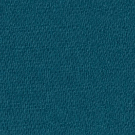 A close-up of a solid teal blue textured fabric, showing a fine woven pattern.