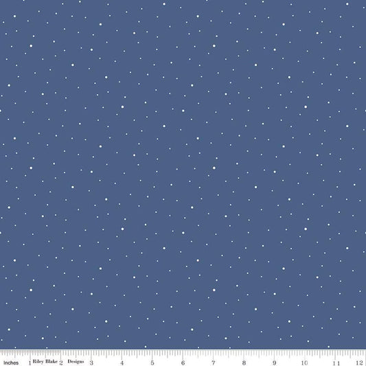 blue background with a scattered pattern of small white dots