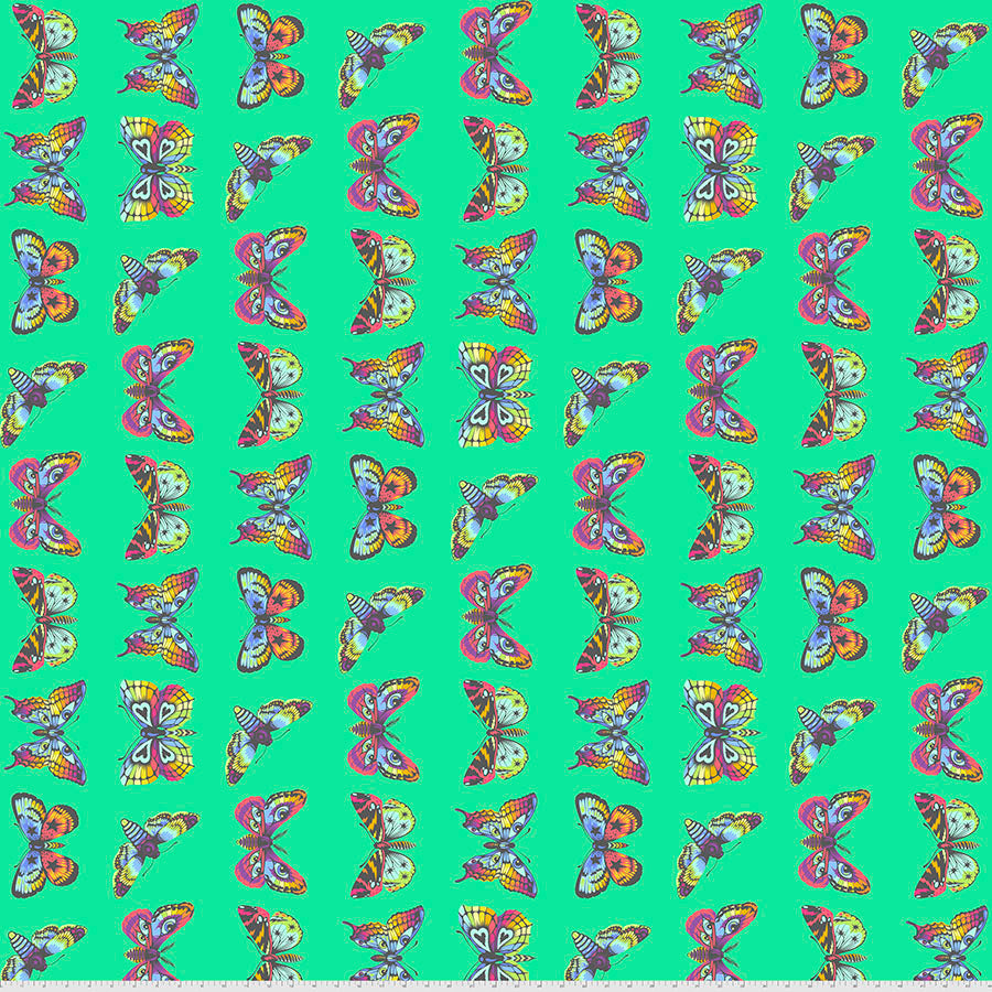 a repeating pattern of colorful butterflies and moths on a  green background.