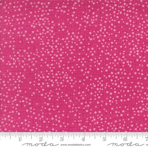 light pink dots on a pink background