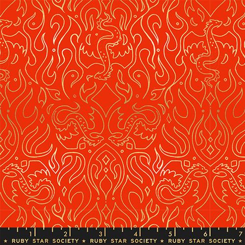 gold dragons on an red orange fabric