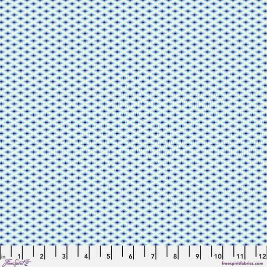 Patterned fabric with blue and white design on a white background