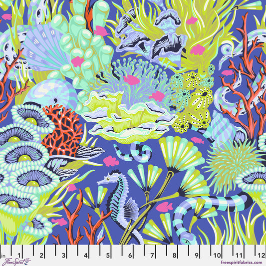Colorful coral and sea life pattern on a blue background