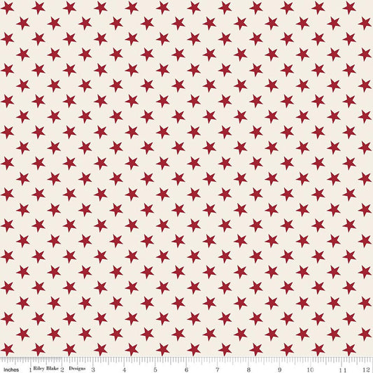 Pattern of red stars on a beige background 