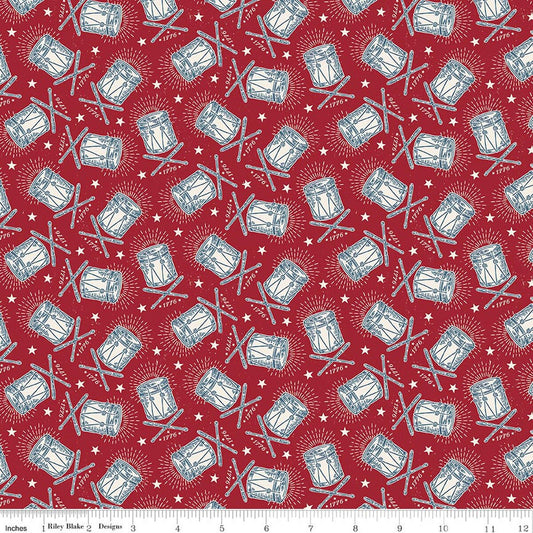 Pattern of drums and drumsticks on a red background 