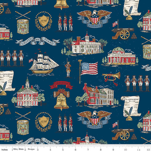A repeating fabric pattern on a dark navy blue background featuring historical American motifs including the Liberty Bell, American flags, eagles, cannons, ships, buildings, and figures