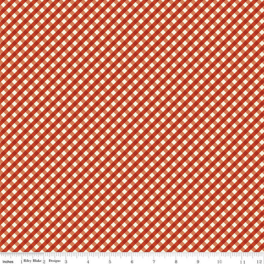 A close-up of a red and white gingham fabric pattern 