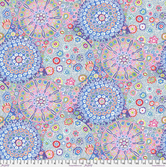 Colorful floral and geometric patterned fabric.