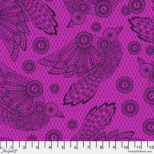 Decorative fabric with black lace-like patterns on a pink background