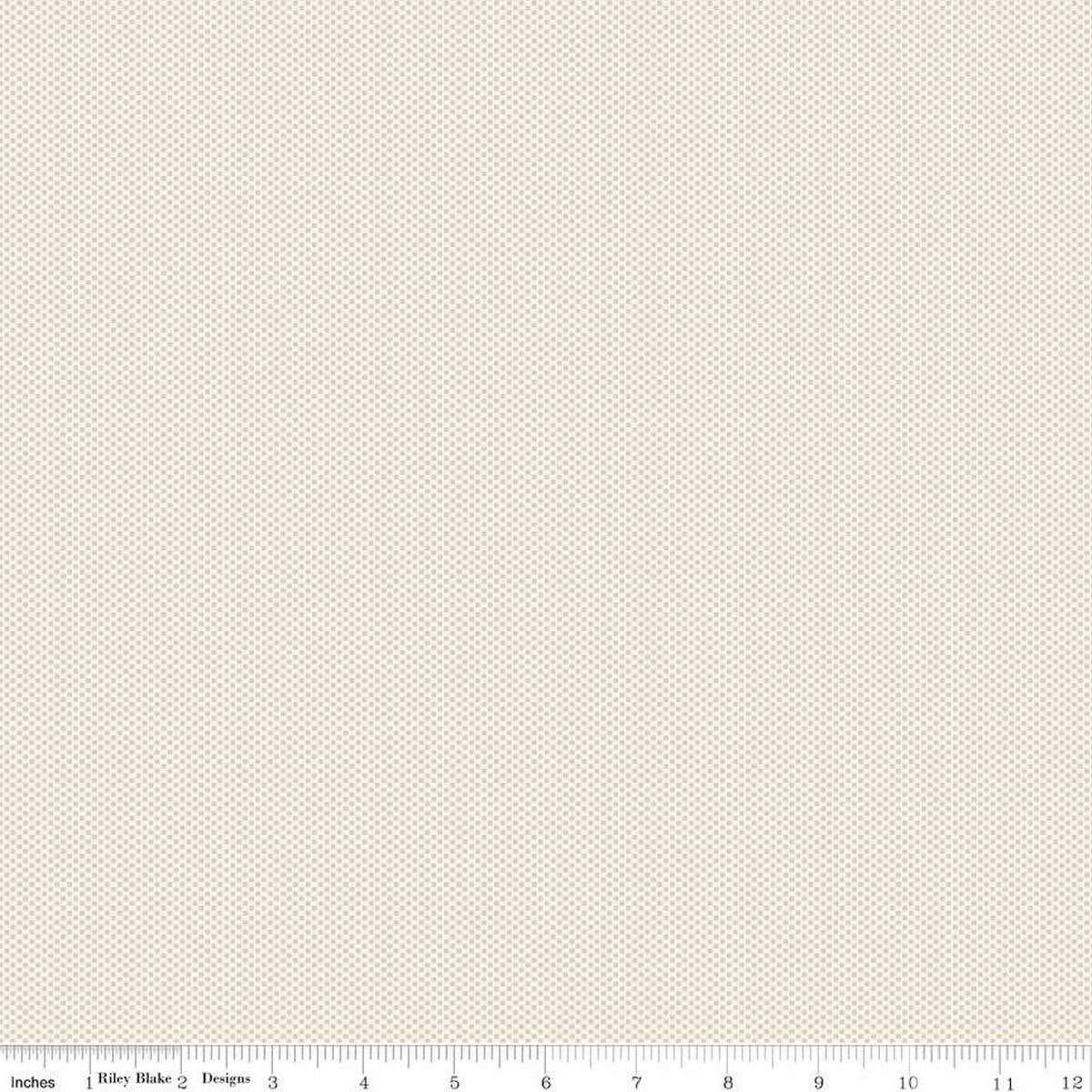 A close-up fabric swatch showing a fine micro-dot pattern in beige and cream