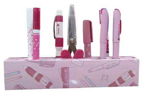 Set of stationery items including pens, glue sticks, and scissors