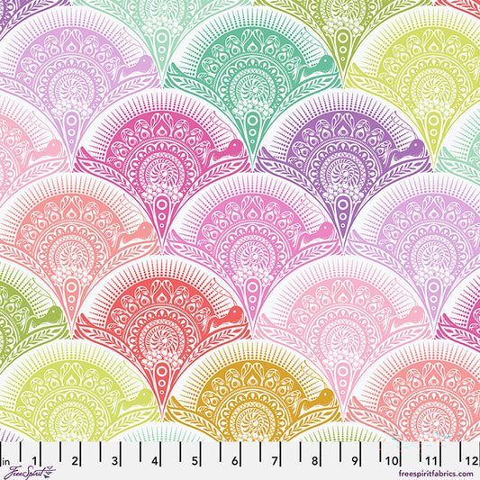 Colorful scalloped patterned fabric on a white background.
