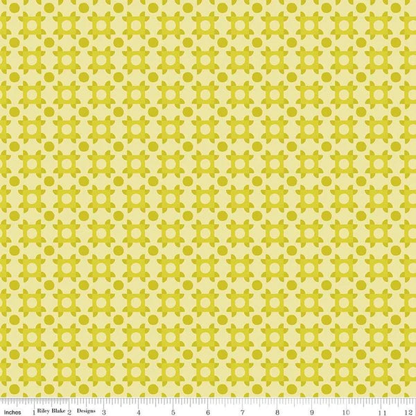 repeating geometric design on a mustard yellow background