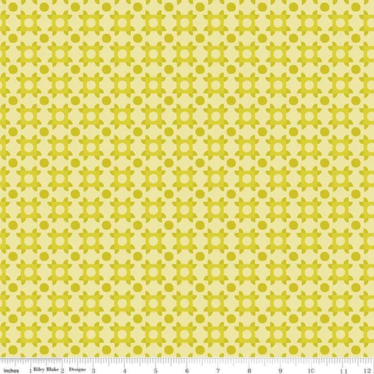 repeating geometric design on a mustard yellow background