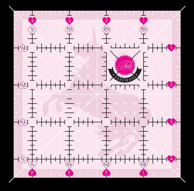 Pink square ruler with measurement markings and an unicorn logo on a pink background
