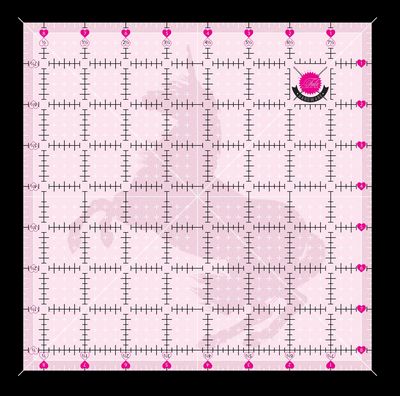 Pink square ruler with measurement markings and an unicorn logo on a pink background
