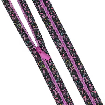 Two floral-patterned zippers with pink pull tabs on a white background
