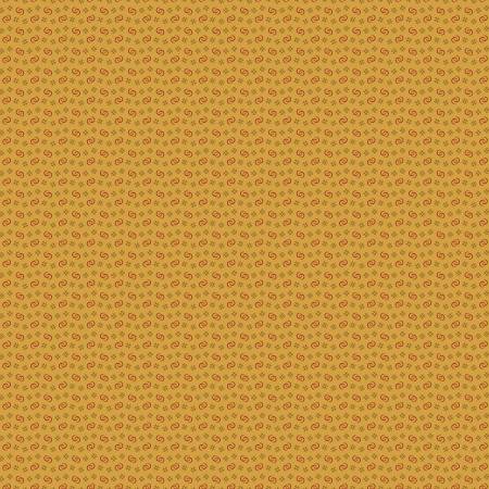 A close-up of a repeating paisley pattern in rust red on a warm mustard-yellow background.