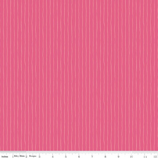 A close-up of a pink fabric with a vertical wavy stripe pattern