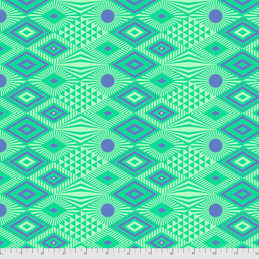  featuring a geometric pattern with diamonds, triangles, and dots in shades of blue and green on an aqua-green background.