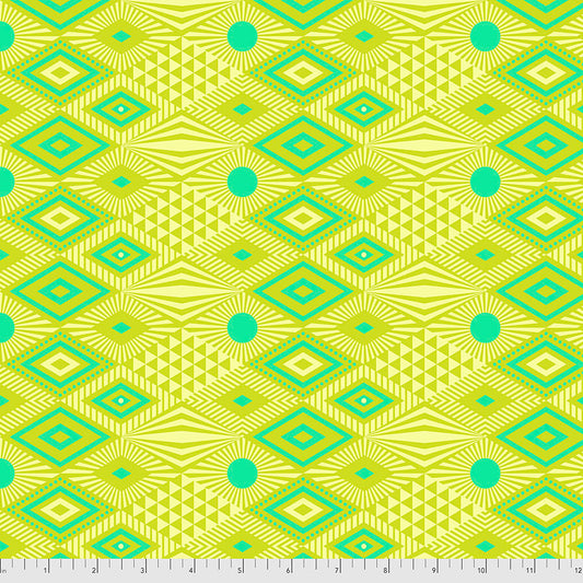 featuring a geometric pattern with green and teal diamonds, triangles, and dots on a bright yellow backing.