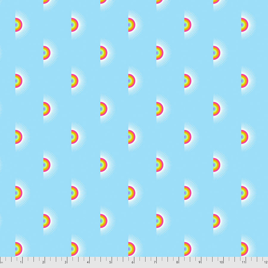 A pattern of rainbows on a blue sky background.