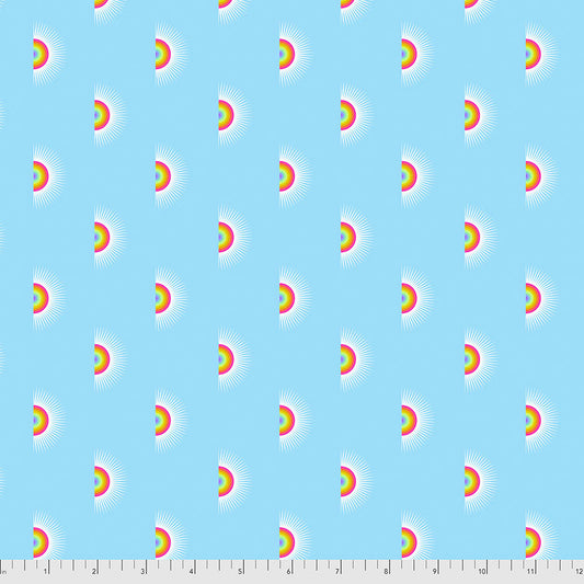 A pattern of rainbows on a blue sky background.